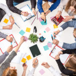 One benefit of collaborative office spaces is that it encourages teamwork.